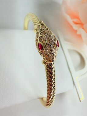 Gold-Tone Snake Cuff Bracelet with Ruby Accent